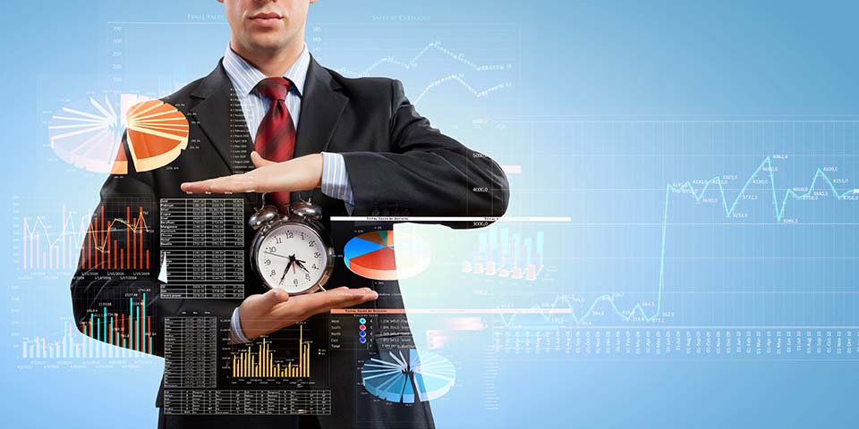 Image of a business man with charts holding a clock